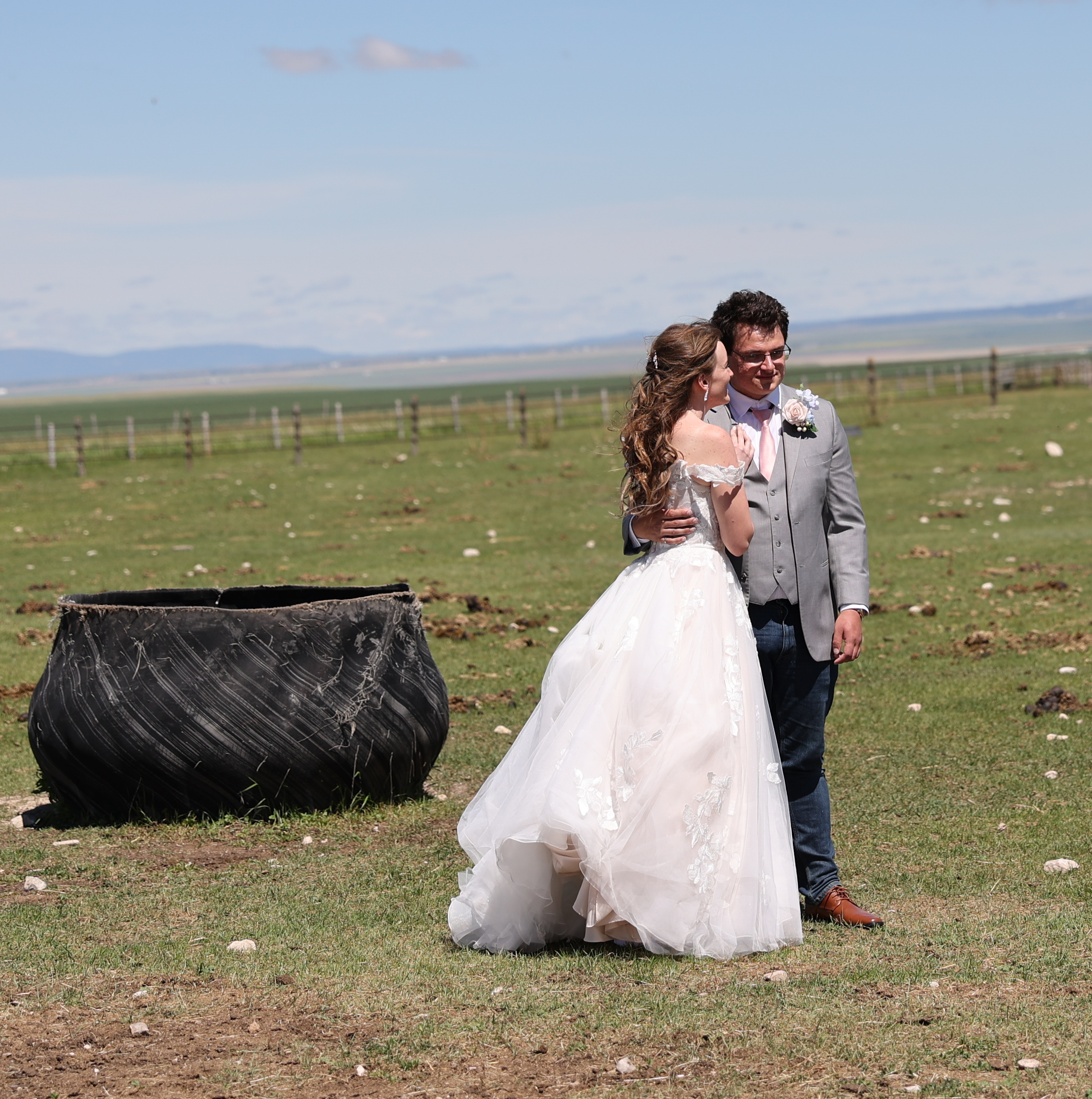 This image shows Dylan and Rachael Dean just after getting married at her family's ranch.